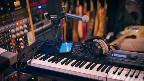 Microphone on a boom stand in a recording studio