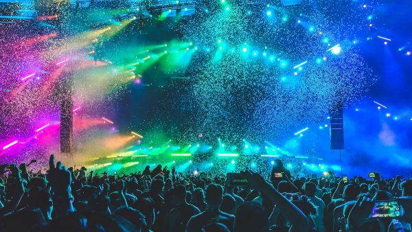 Festival main stage with lighting rig at sunset